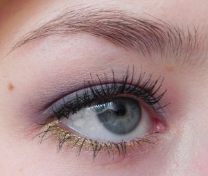 Eye makeup: purple and gold